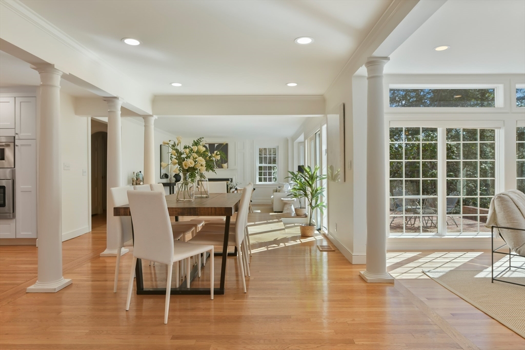 17 Laurel Road Brookline, MA 02467 - Photo 6 of 29 a view of a dining room with furniture and wooden floor