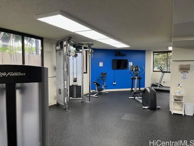 a view of a room with gym equipment