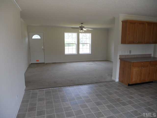 13061 Edwards Road Spring Hope, NC 27882 - Photo 6 of 12 a view of an empty room with a window