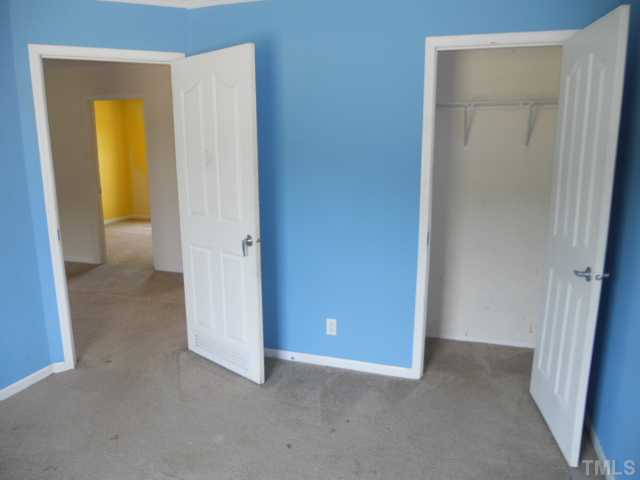 13061 Edwards Road Spring Hope, NC 27882 - Photo 8 of 12 a view of an empty room with a hallway