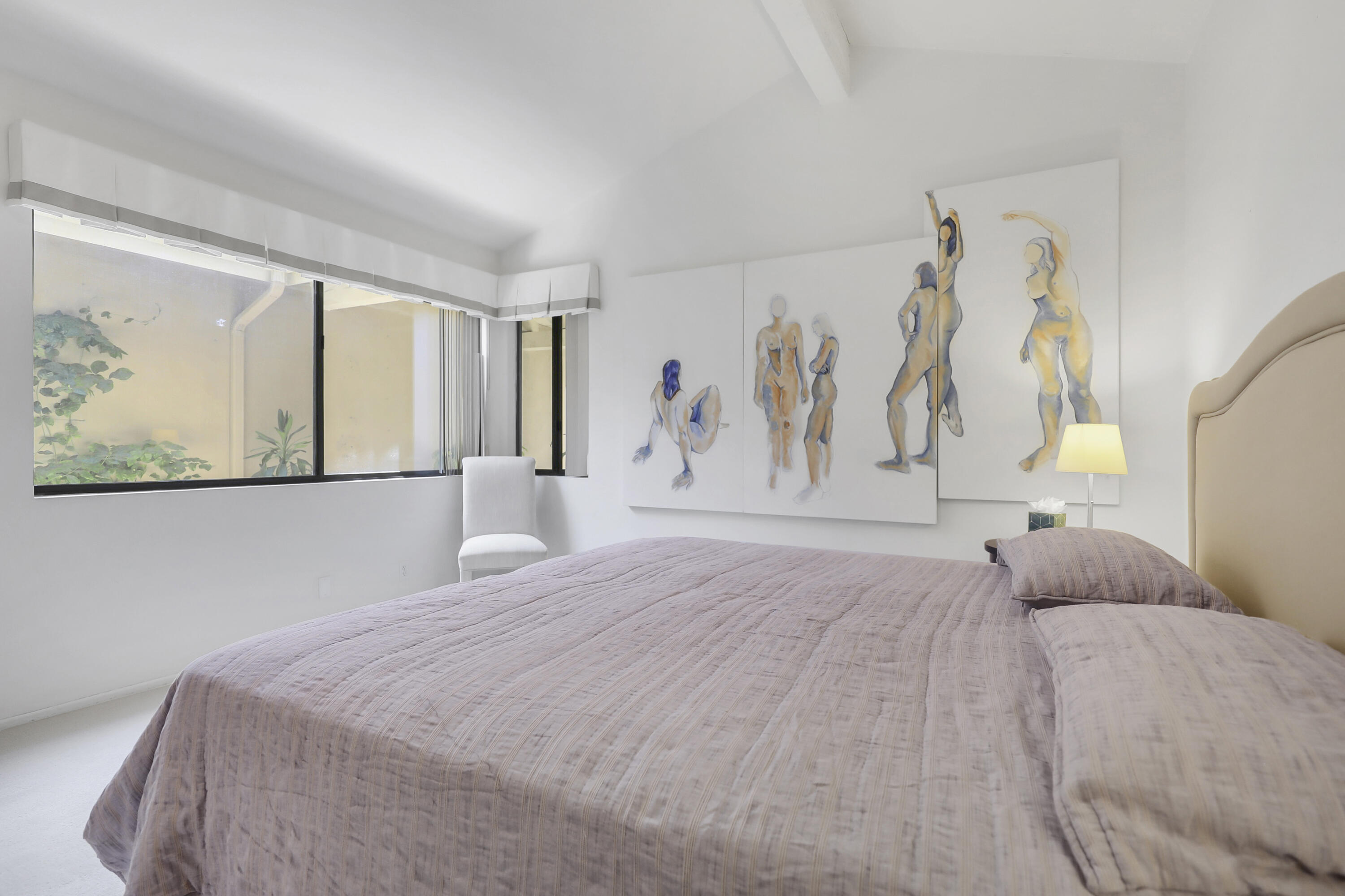 164 Deer Spring Way Palm Desert, CA 92211 - Photo 13 of 30 a bedroom with a large bed and a painting on the wall