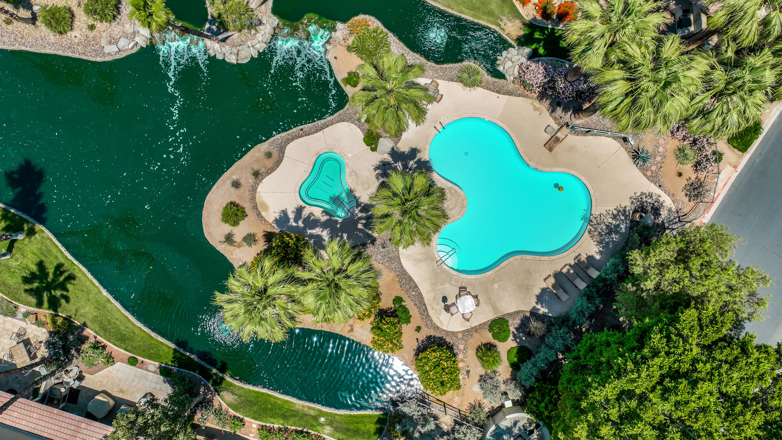 164 Deer Spring Way Palm Desert, CA 92211 - Photo 30 of 30 an aerial view of a swimming pool with outdoor seating and yard