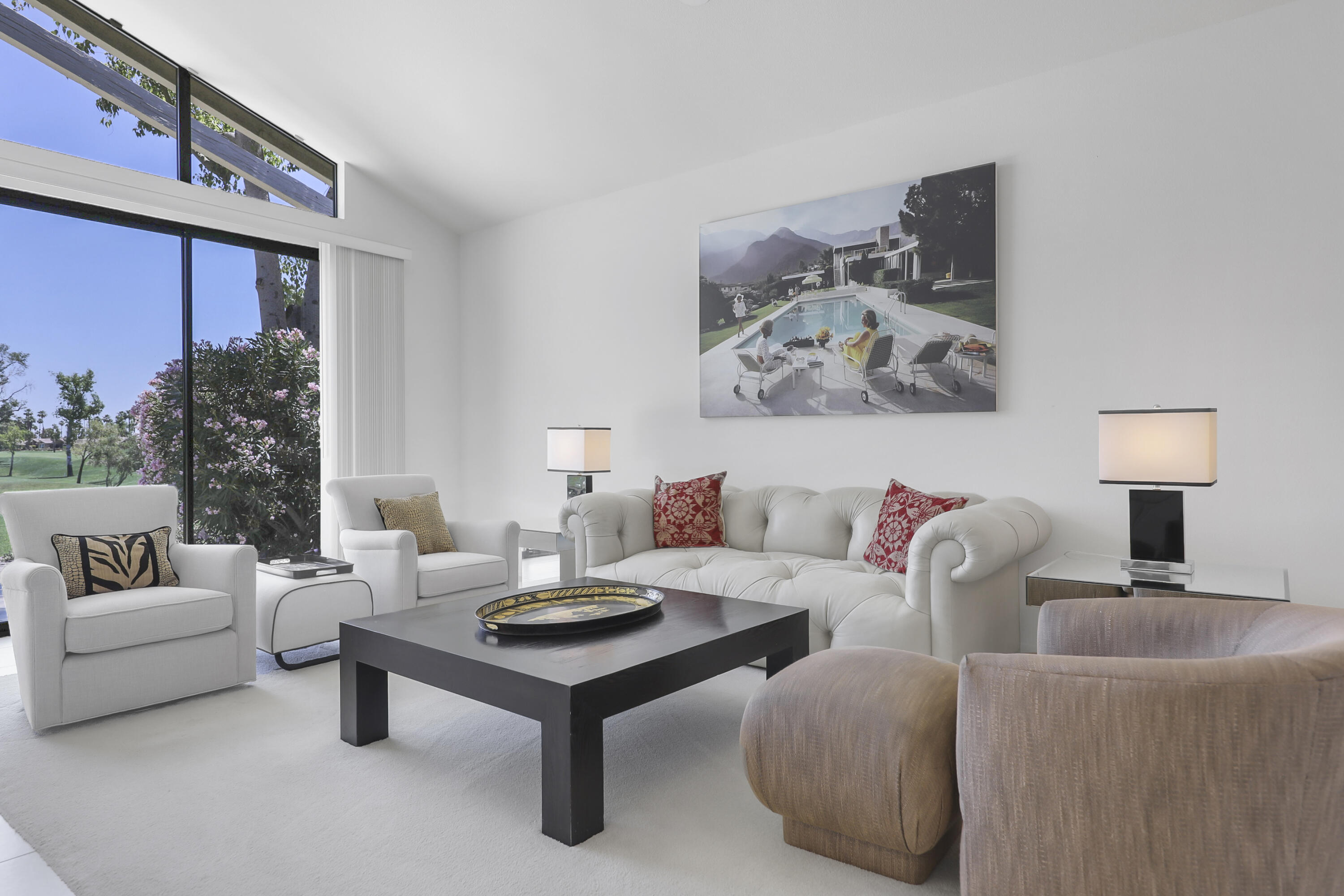 164 Deer Spring Way Palm Desert, CA 92211 - Photo 4 of 30 a living room with furniture and a lamp