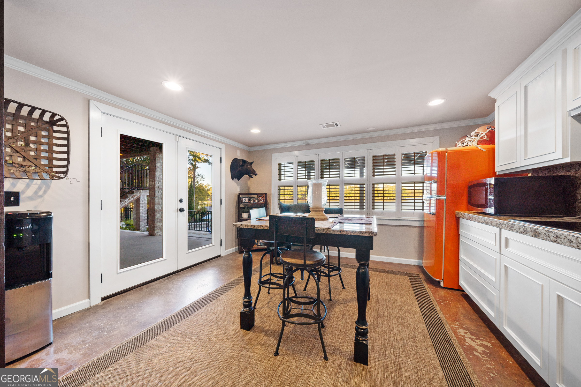 121 Grace Trace Lizella, GA 31052 - Photo 106 of 197 a view of a dining room with furniture and wooden floor