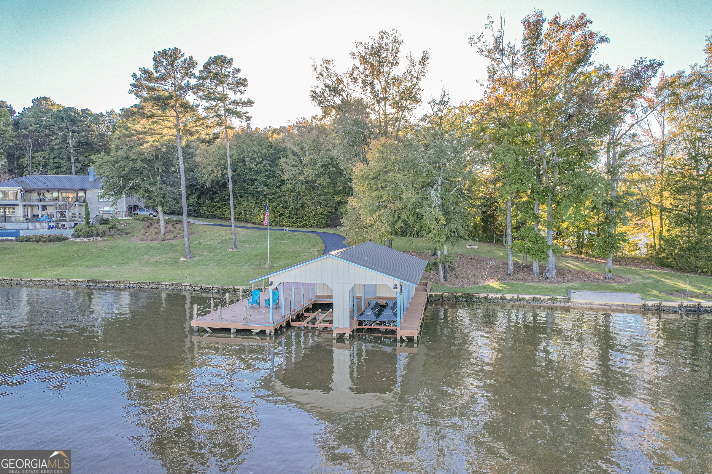 121 Grace Trace Lizella, GA 31052 - Photo 126 of 197 a view of a lake with a house swimming pool and outdoor space