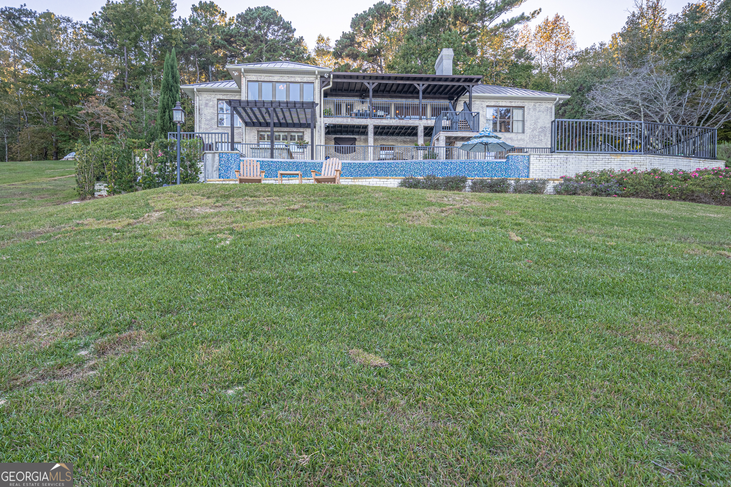 121 Grace Trace Lizella, GA 31052 - Photo 159 of 197 a view of a house with a yard and sitting area
