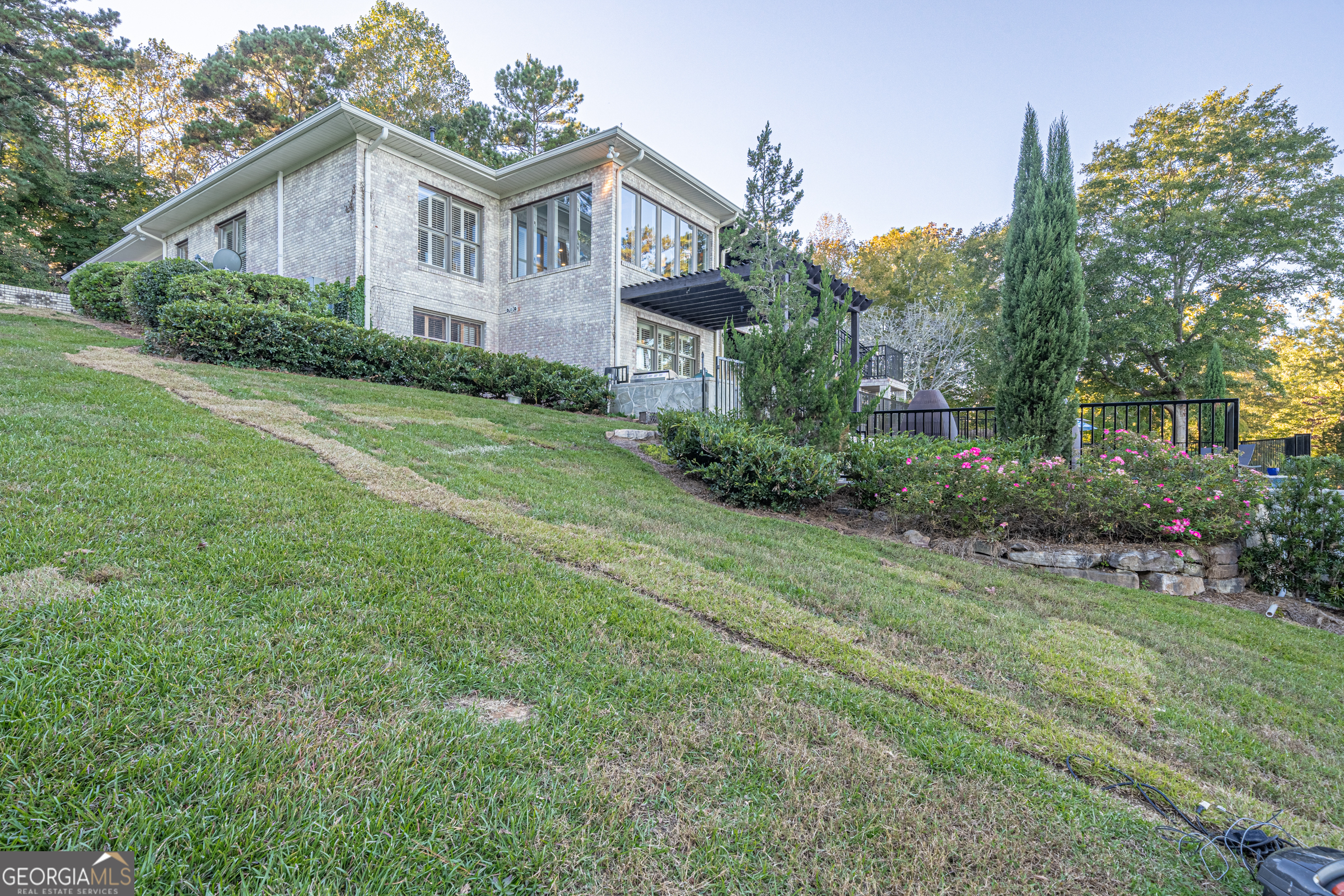 121 Grace Trace Lizella, GA 31052 - Photo 171 of 197 a view of a big house with a big yard plants and large trees