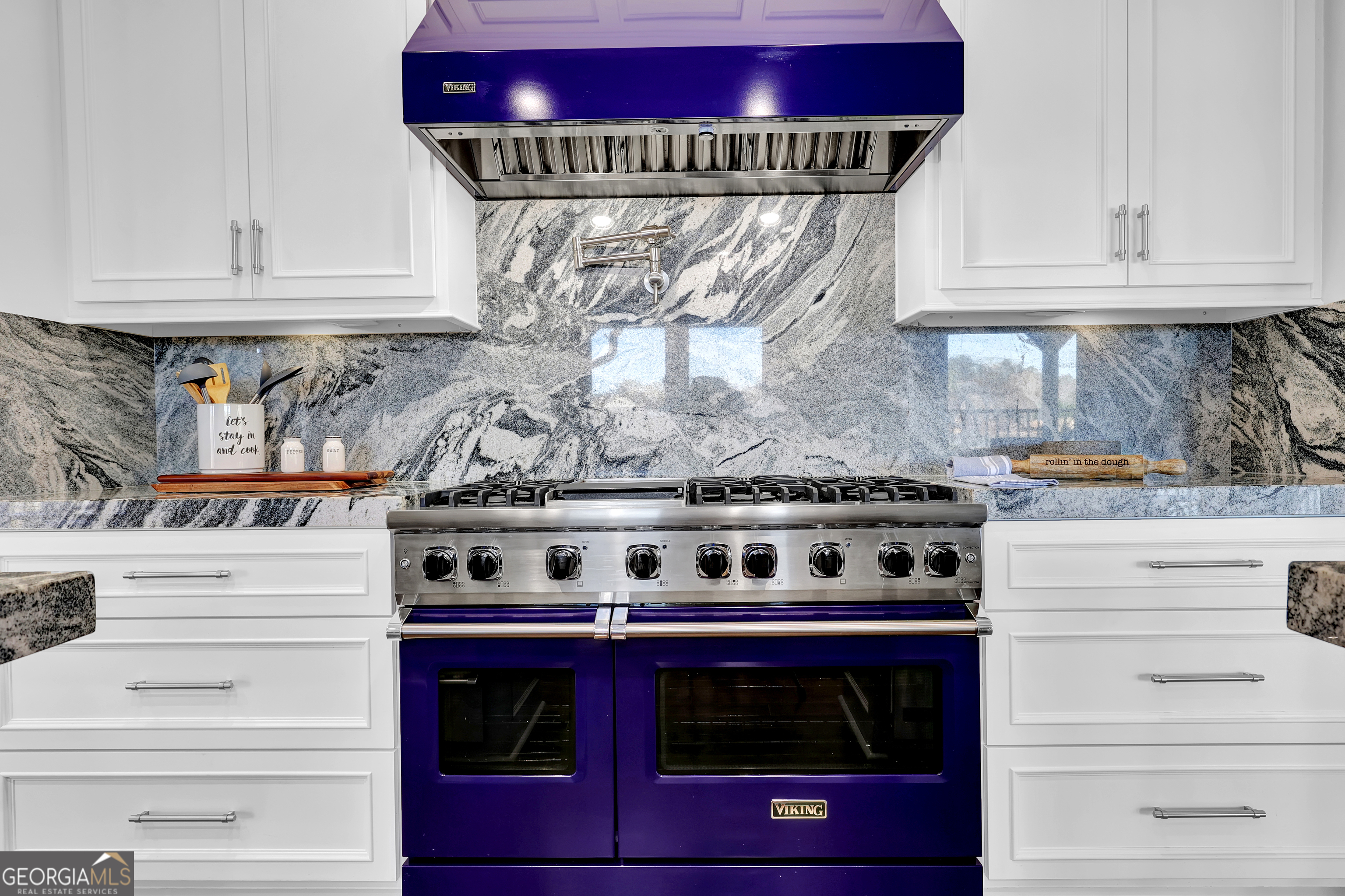 121 Grace Trace Lizella, GA 31052 - Photo 23 of 197 a stove top oven sitting inside of a kitchen and granite counter tops