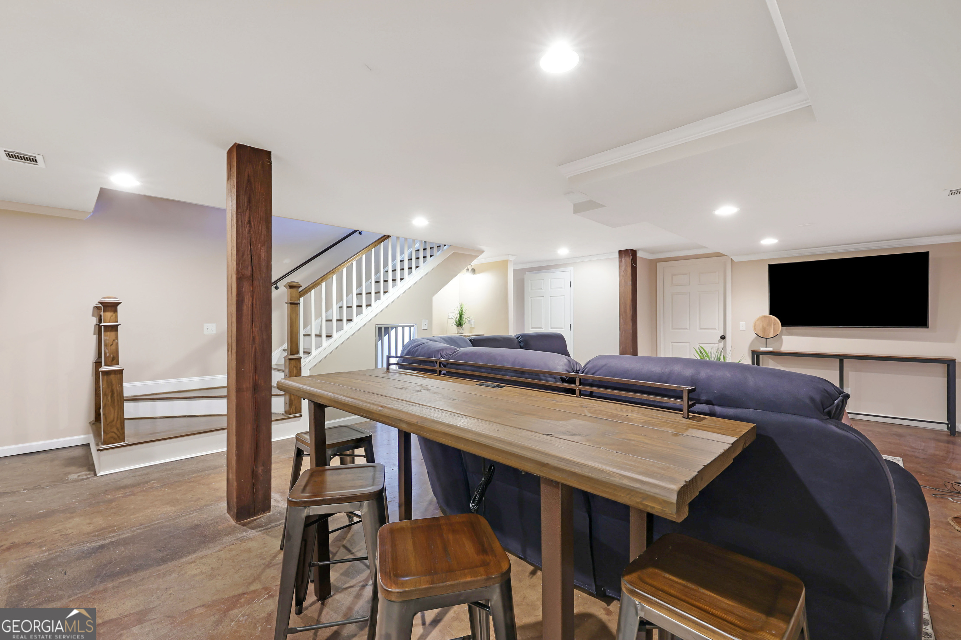 121 Grace Trace Lizella, GA 31052 - Photo 4 of 197 a living room with furniture and a flat screen tv