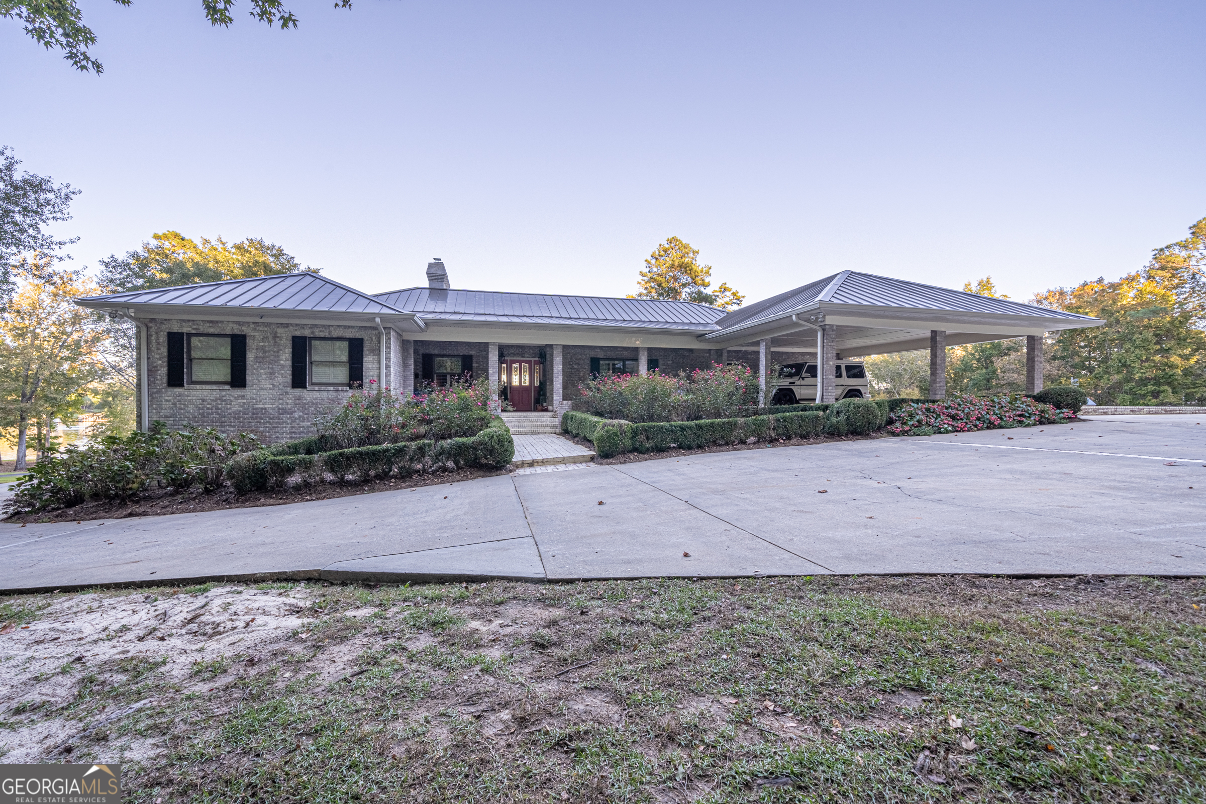 121 Grace Trace Lizella, GA 31052 - Photo 47 of 197 a front view of a house with a yard and a garage