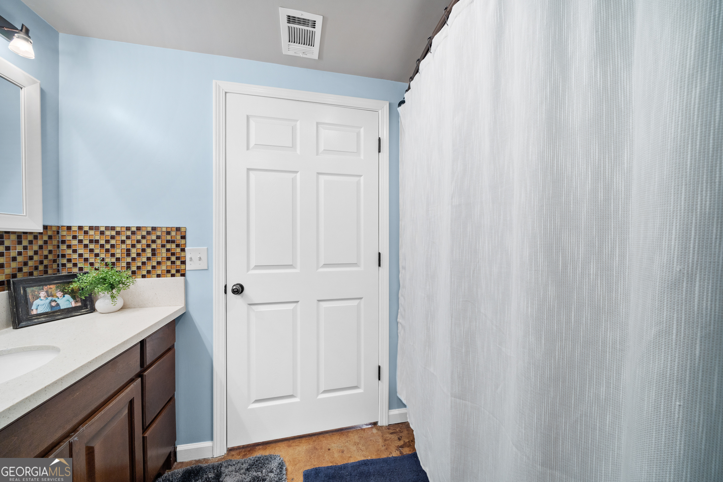 121 Grace Trace Lizella, GA 31052 - Photo 63 of 197 a room that has a bed and a dresser in it