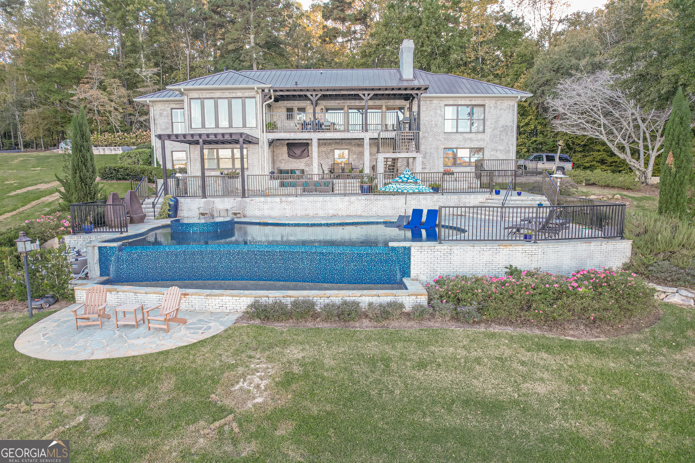 121 Grace Trace Lizella, GA 31052 - Photo 64 of 197 a view of a house with backyard and sitting area