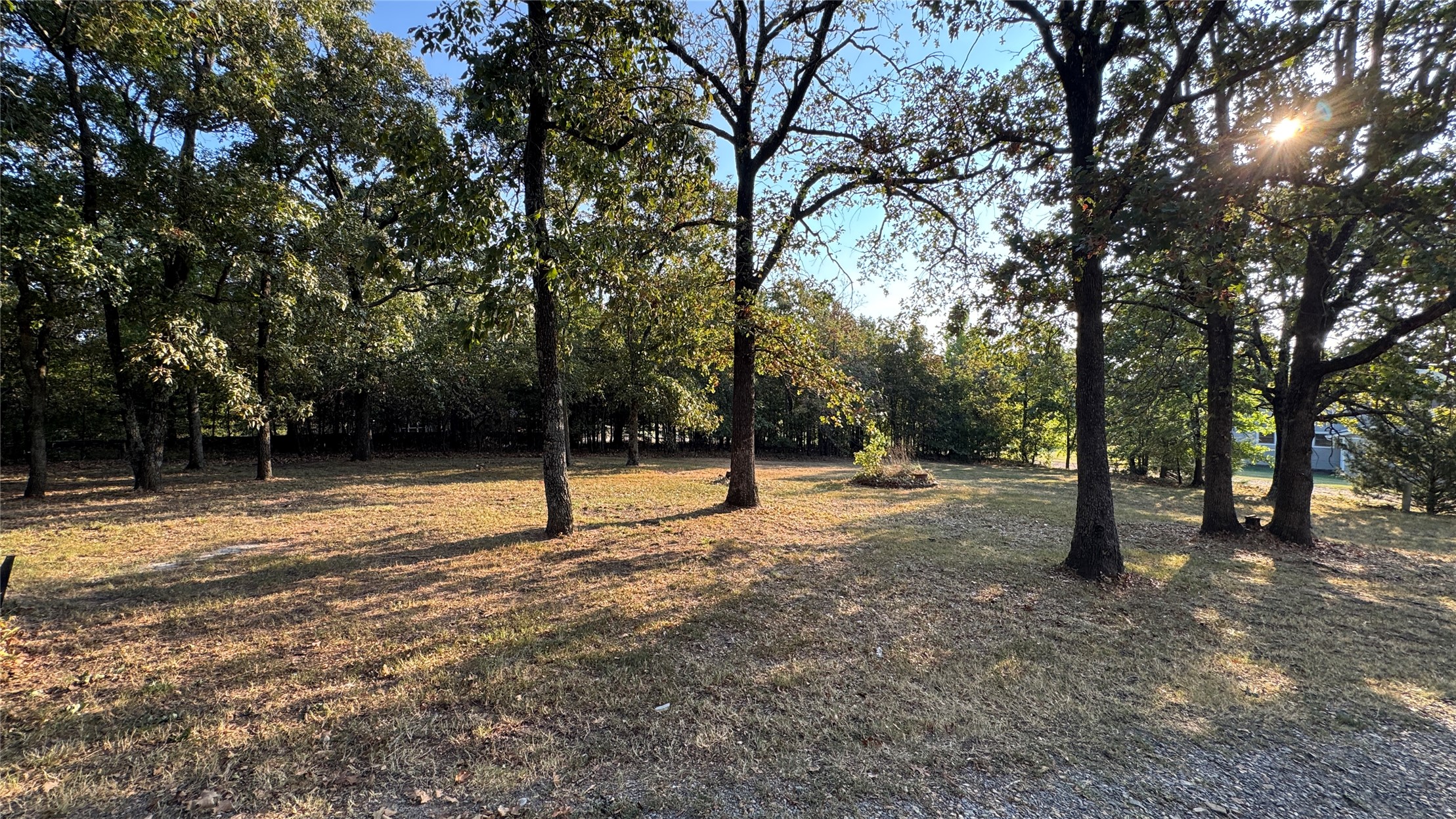 96358 South 4531 Road Vian, OK 74962 - Photo 51 of 58 Expansive lot featuring mature trees and established ground cover