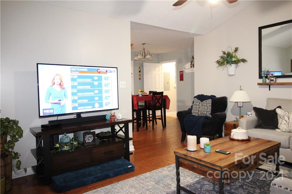 1900 Mt Pleasant Road North Concord, NC 28025 - Photo 6 of 21 a living room with furniture and a flat screen tv