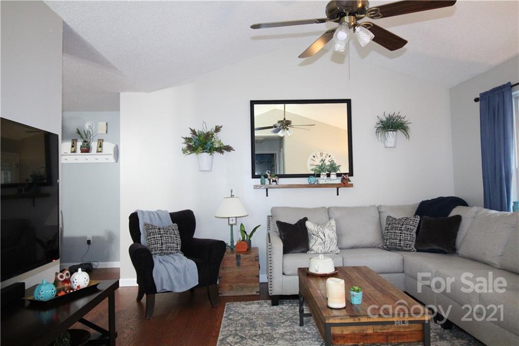 1900 Mt Pleasant Road North Concord, NC 28025 - Photo 7 of 21 a living room with furniture and a flat screen tv