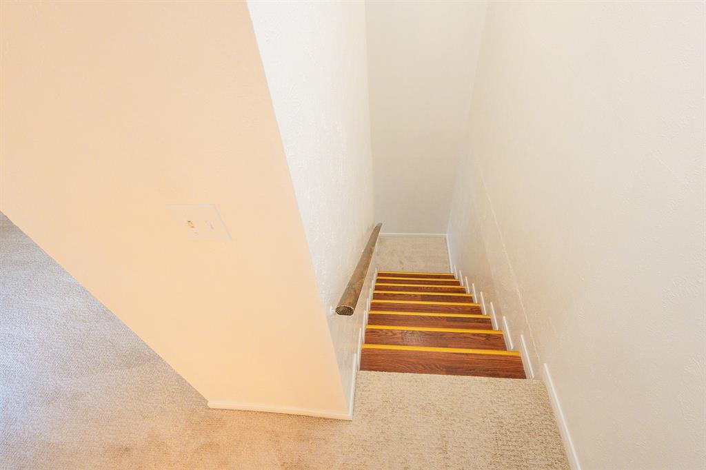 5540 Boca Raton Boulevard, Unit 175 Fort Worth, TX 76112 - Photo 17 of 30 Stairs featuring carpet flooring and baseboards