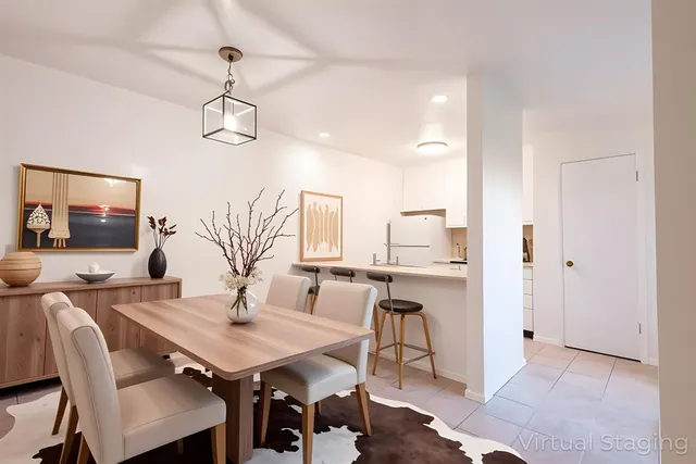 a view of a dining room with furniture