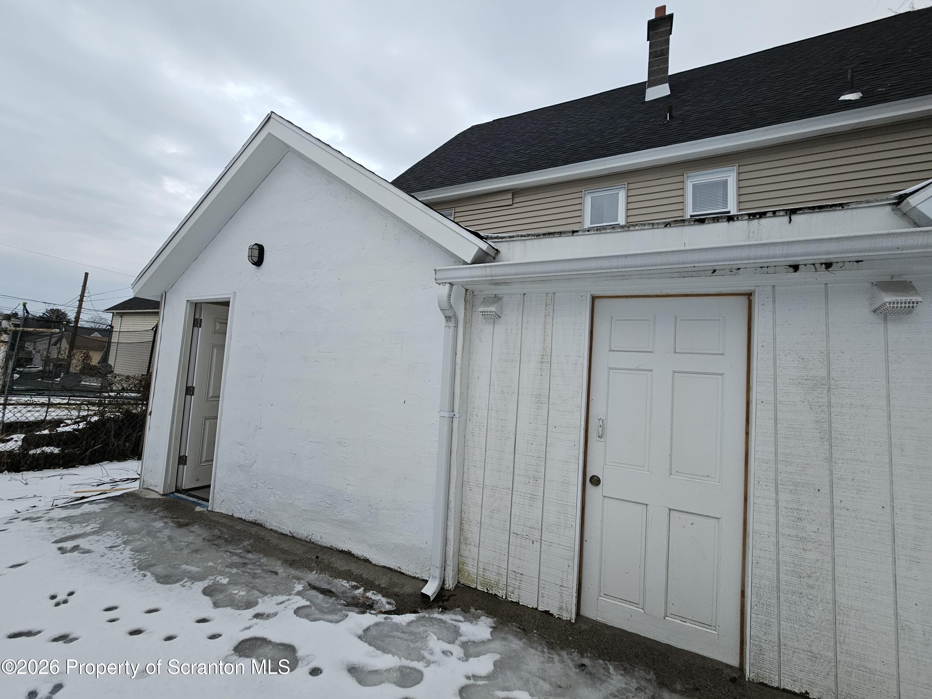 1517 Brick Avenue Scranton, PA 18508 - Photo 11 of 12 a view of a house with a wooden door