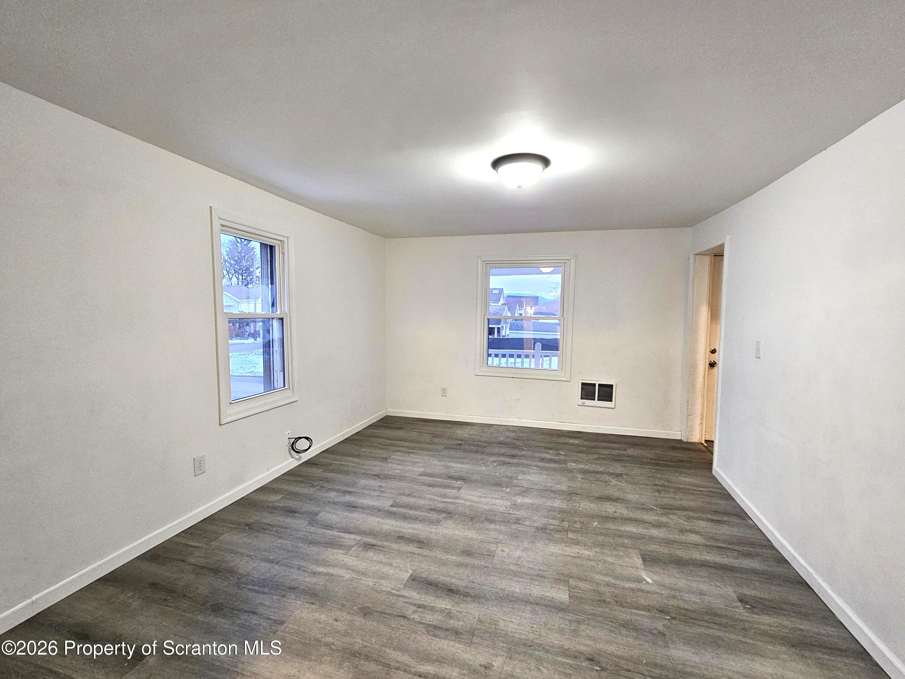 1517 Brick Avenue Scranton, PA 18508 - Photo 6 of 12 an empty room with windows