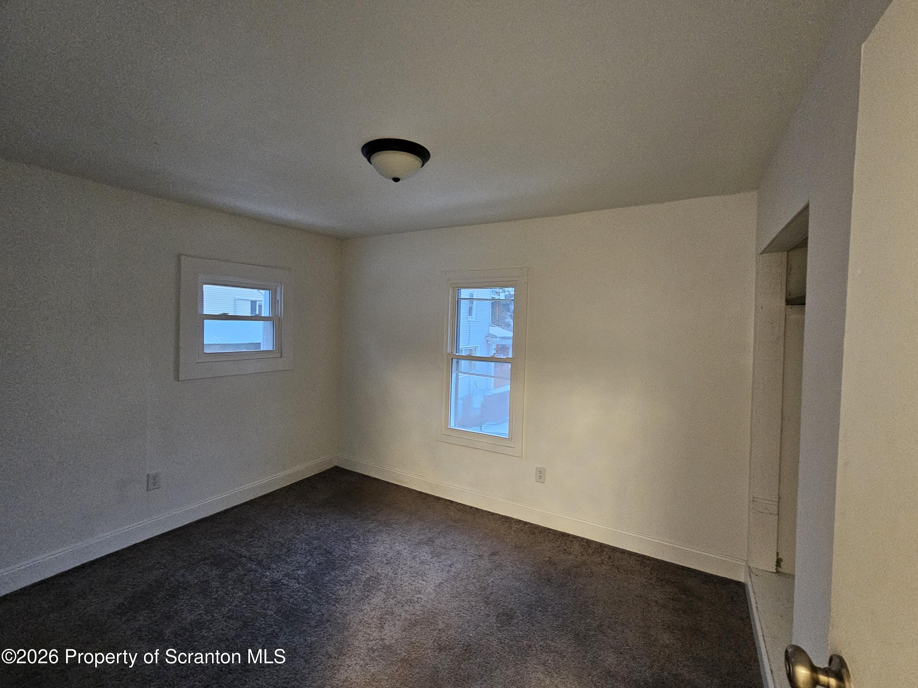 1517 Brick Avenue Scranton, PA 18508 - Photo 9 of 12 an empty room with a window