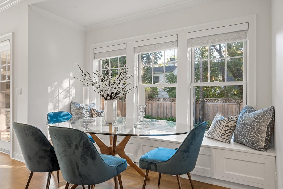 1625 Sunset Ridge Road Glenview, IL 60025 - Photo 16 of 49 a dining room with furniture and wooden floor