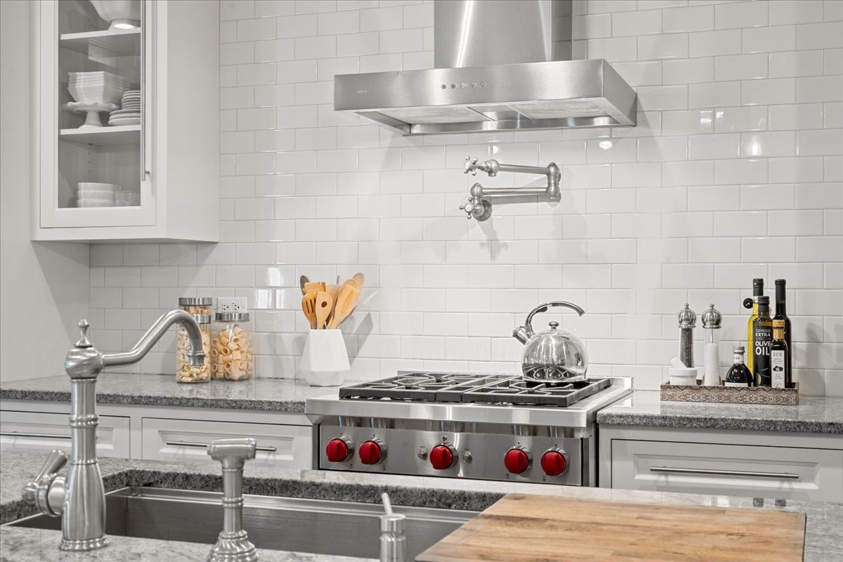 1625 Sunset Ridge Road Glenview, IL 60025 - Photo 17 of 49 a kitchen with a stove and cabinets