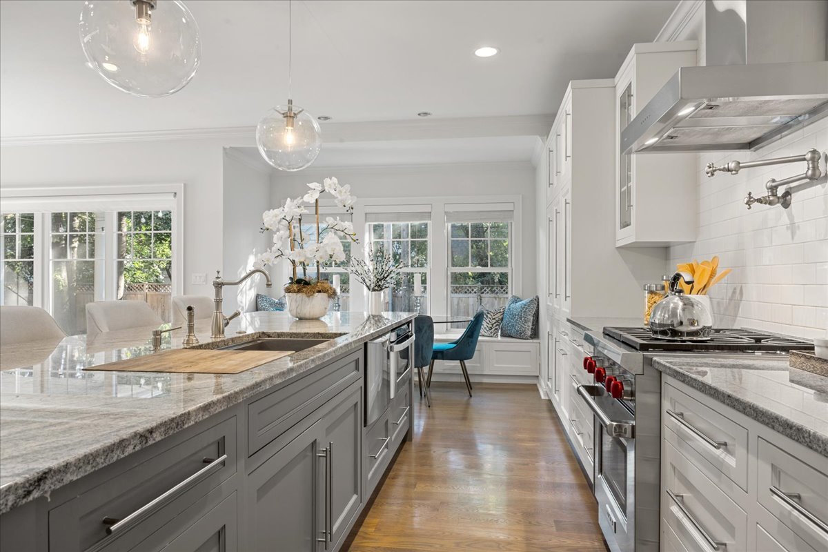 1625 Sunset Ridge Road Glenview, IL 60025 - Photo 20 of 49 a kitchen with stainless steel appliances granite countertop a sink stove and cabinets