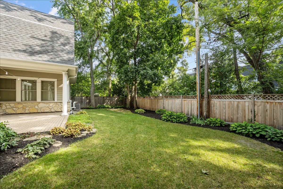 1625 Sunset Ridge Road Glenview, IL 60025 - Photo 27 of 49 a view of backyard of house with green space