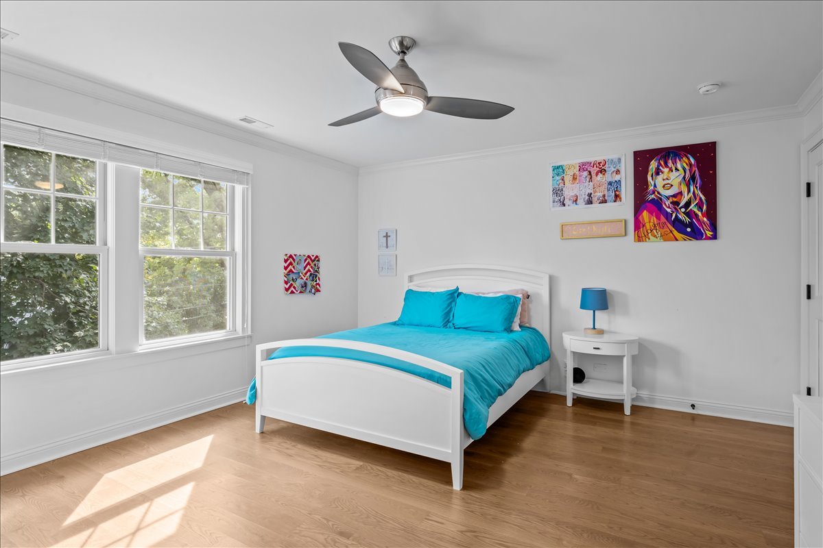 1625 Sunset Ridge Road Glenview, IL 60025 - Photo 34 of 49 a bedroom with a bed and a large window