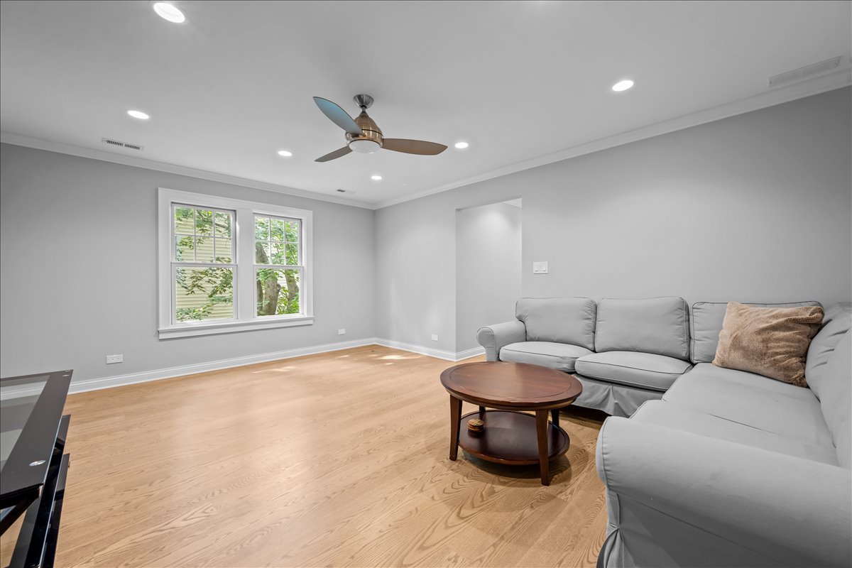 1625 Sunset Ridge Road Glenview, IL 60025 - Photo 40 of 49 a living room with furniture and a large window