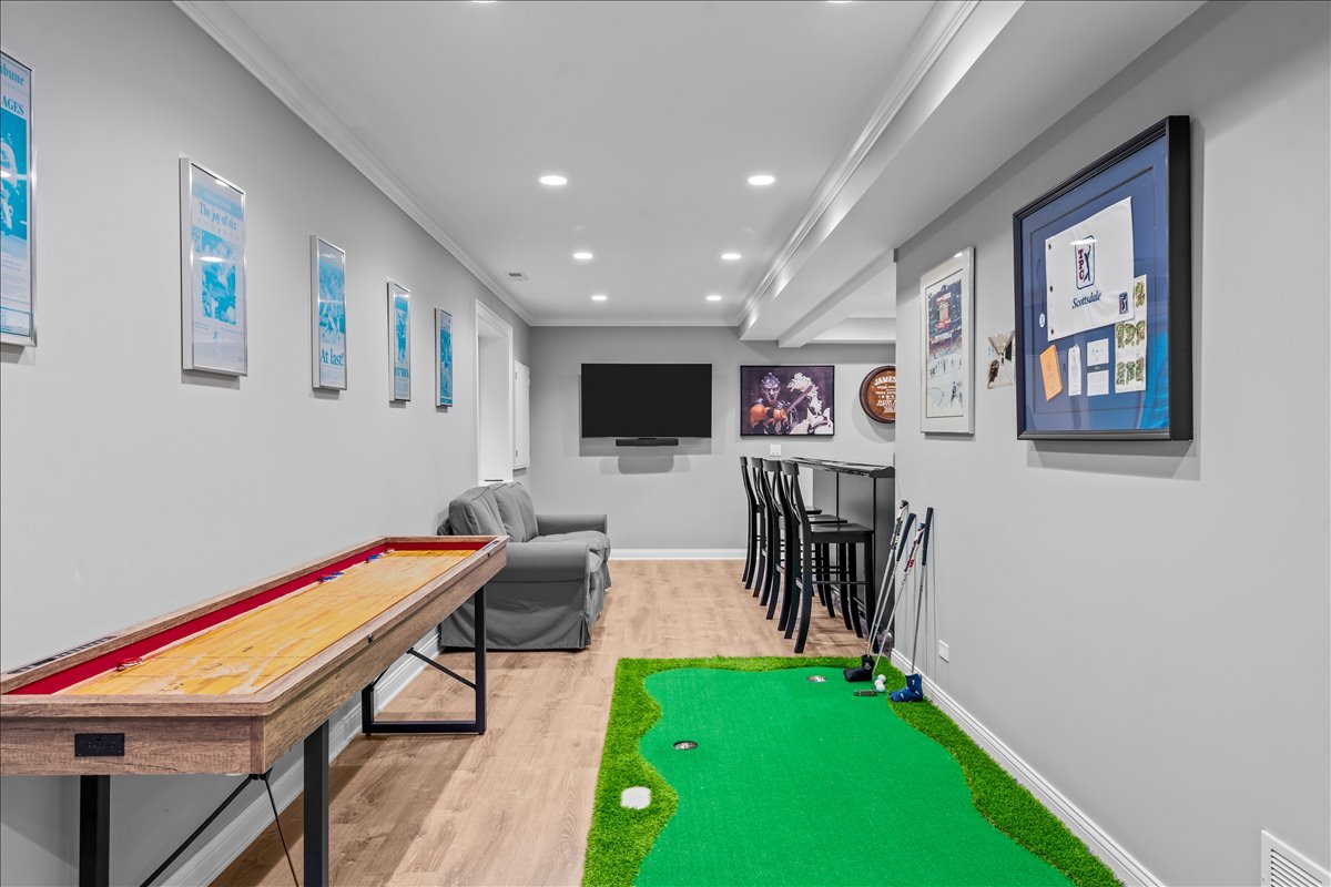 1625 Sunset Ridge Road Glenview, IL 60025 - Photo 43 of 49 a living room with furniture and a flat screen tv