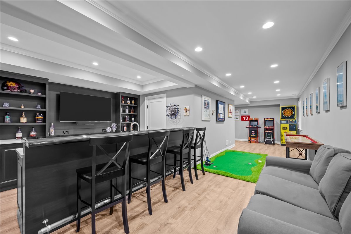 1625 Sunset Ridge Road Glenview, IL 60025 - Photo 44 of 49 a living room with furniture and a flat screen tv