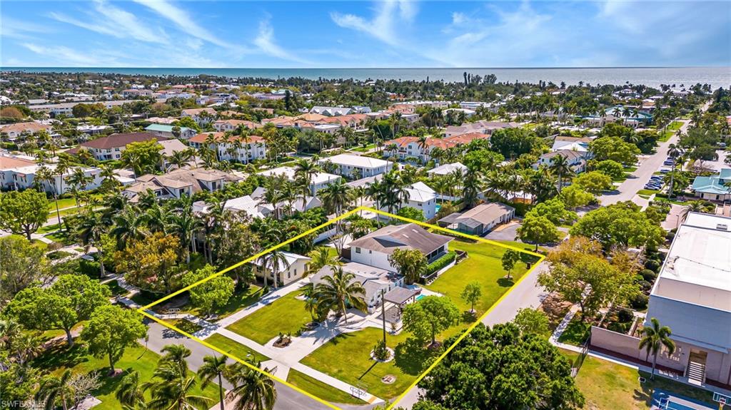 560 9th Avenue South Naples, FL 34102 - Photo 1 of 10 an aerial view of residential houses with outdoor space and street view