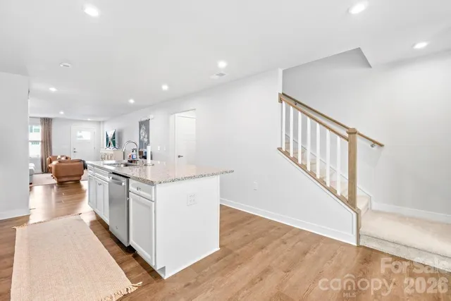a view of living room with a sink and dishwasher