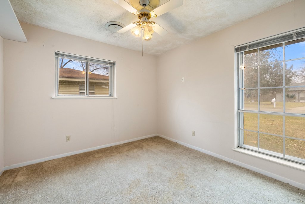 2204 Smith Avenue Taylor, TX 76574 - Photo 30 of 40 an empty room with a window