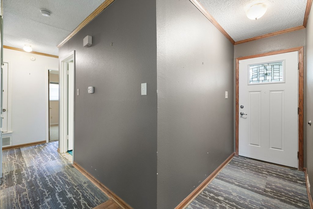 2204 Smith Avenue Taylor, TX 76574 - Photo 5 of 40 a view of hallway with wooden floor