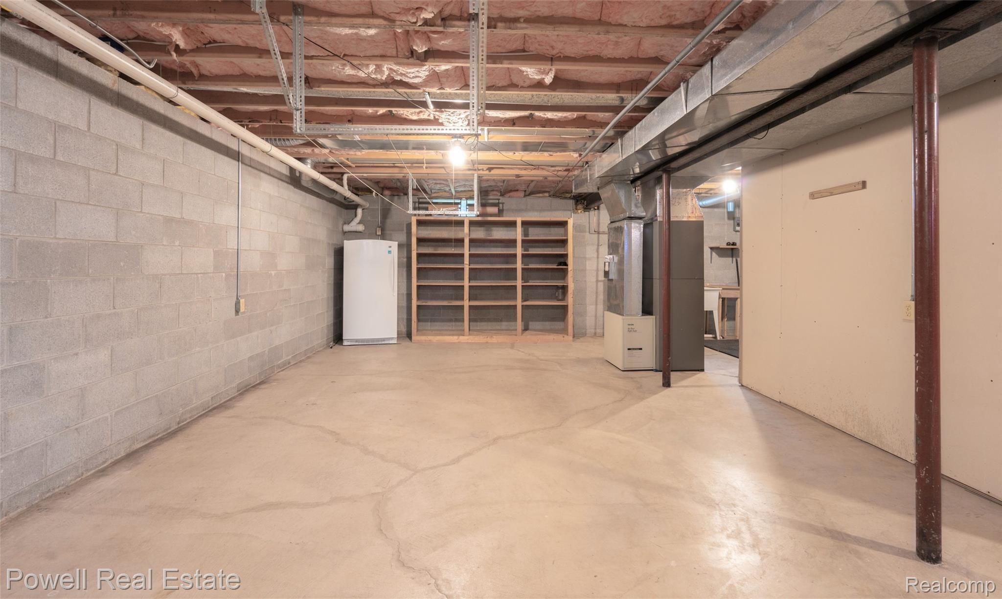 1699 Smith Road Lapeer, MI 48446 - Photo 33 of 54 Basement Freezer stays with house.jpg