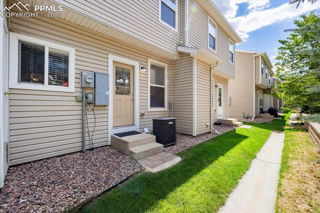 2740 Stonecrop Ridge Grove Colorado Springs, CO 80910 - Photo 35 of 42 Entrance to property with a yard
