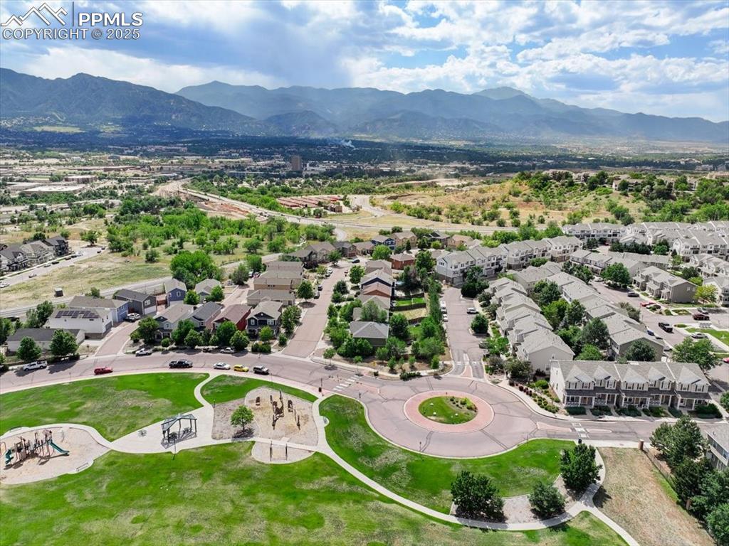 2740 Stonecrop Ridge Grove Colorado Springs, CO 80910 - Photo 41 of 42 Aerial view of residential area featuring mountains