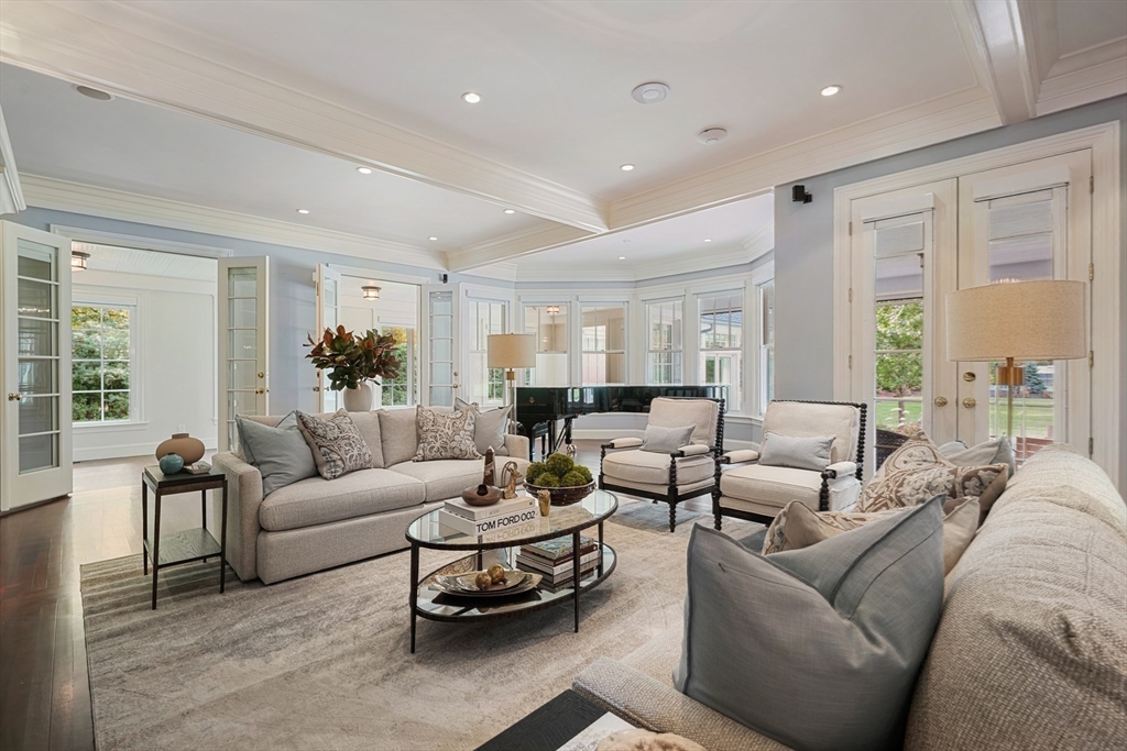 210 Monument Farm Road Concord, MA 01742 - Photo 12 of 42 a living room with furniture and a large window