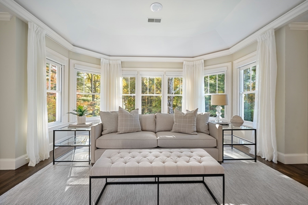 210 Monument Farm Road Concord, MA 01742 - Photo 23 of 42 a living room with furniture and a large window