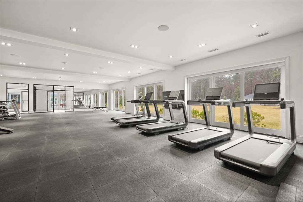 210 Monument Farm Road Concord, MA 01742 - Photo 31 of 42 a view of a room with gym equipment