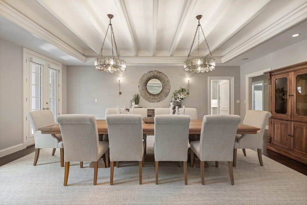 210 Monument Farm Road Concord, MA 01742 - Photo 7 of 42 a view of a dining room with furniture and chandelier