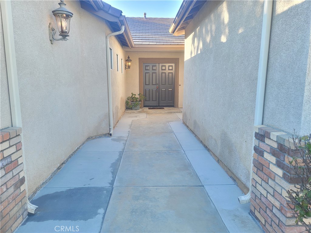 44915 Machon Road Temecula, CA 92592 - Photo 40 of 40 a view of a brick house with windows