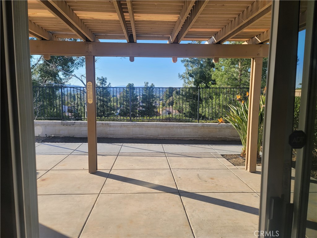 44915 Machon Road Temecula, CA 92592 - Photo 6 of 40 a porch with a glass door