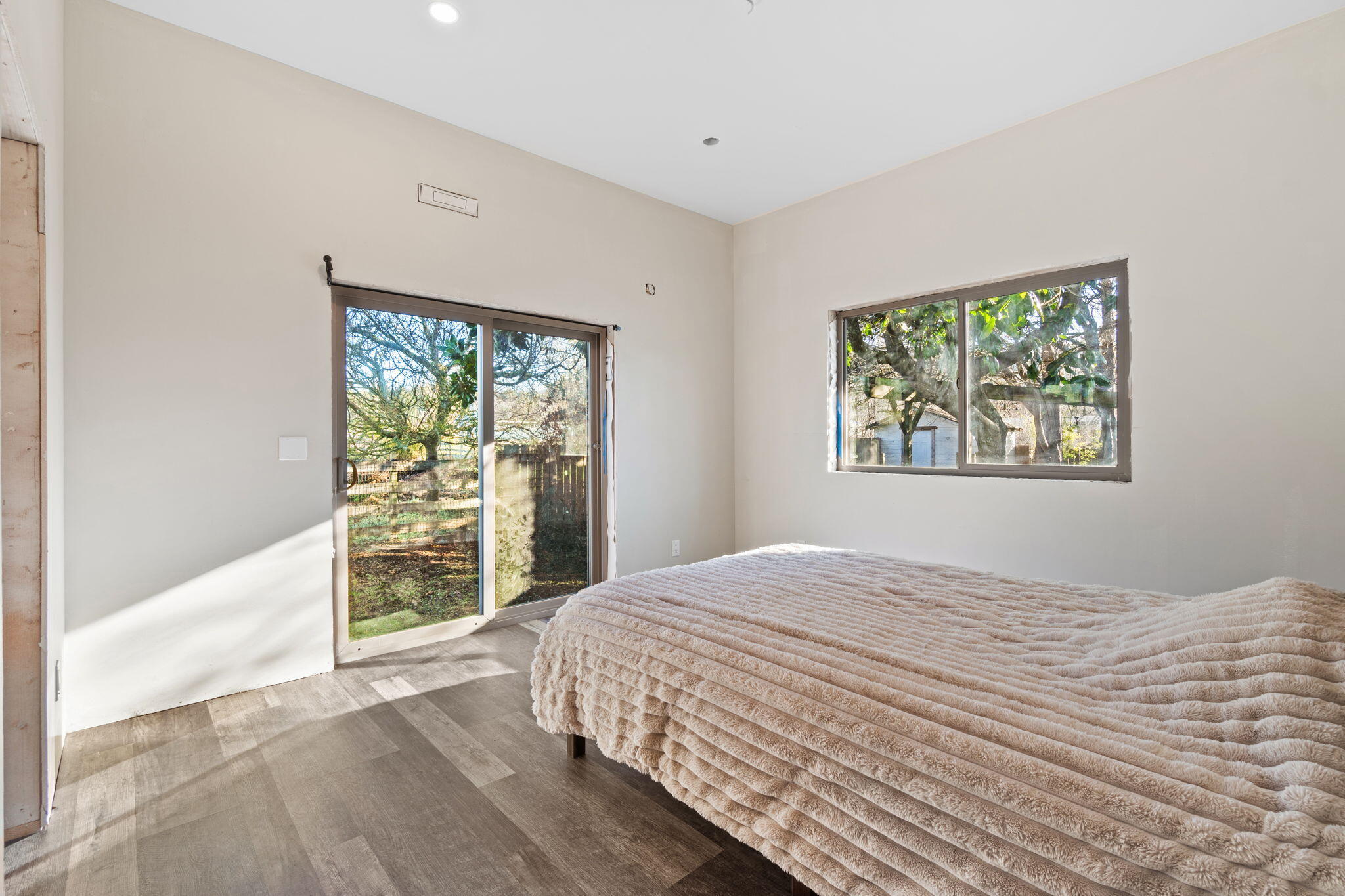 61 Kingston Road Fieldbrook, CA 95519 - Photo 14 of 48 a bedroom with a bed and a window
