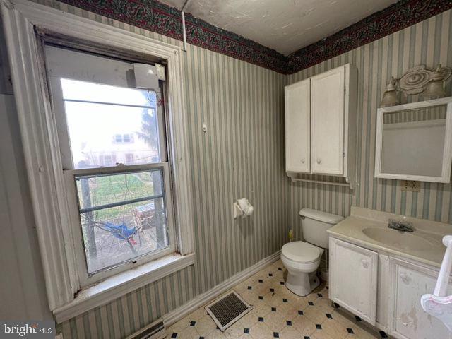 222 2nd Avenue Hanover, PA 17331 - Photo 5 of 10 a bathroom with a sink toilet and window