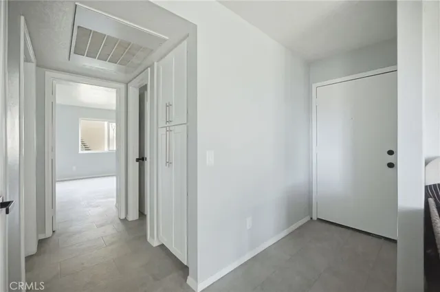 a view of hallway with closet