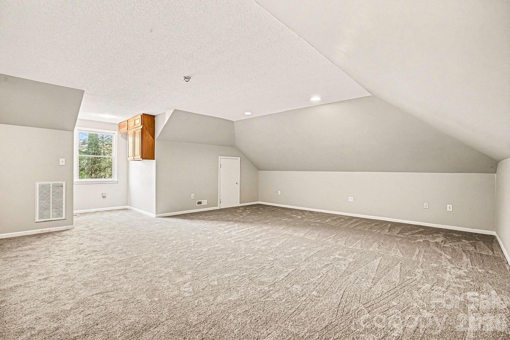 5509 Morgan Mill Road Monroe, NC 28110 - Photo 27 of 33 a view of an empty room with a window