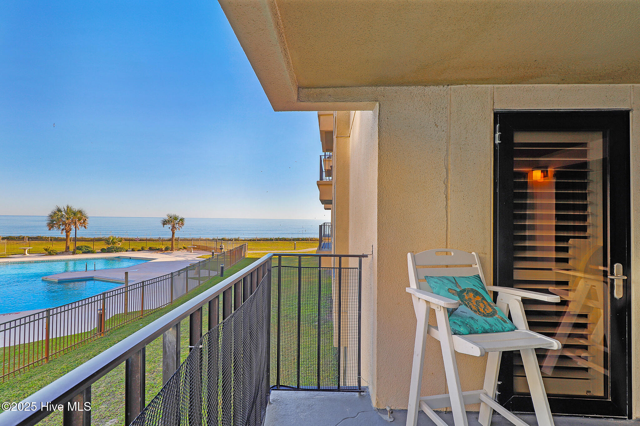 1505 Salter Path Road, Unit 235 SUMMER WINDS Indian Beach, NC 28512 - Photo 13 of 46 Ocean & pool views from covered porch